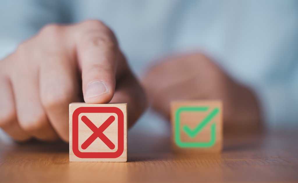 JetBrains discontinues Fleet IDE | InfoWorld Two building blocks pictured, one with a green check mark and the other with a red x, standing for cancelation. The x is pushed to the foreground by a human hand.