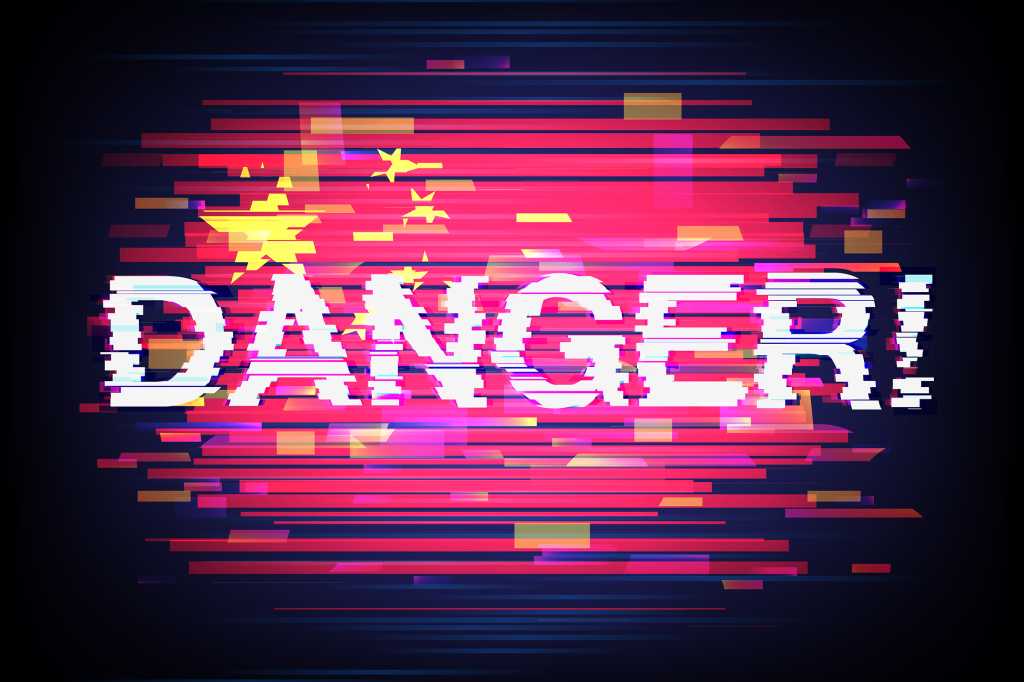 The biggest AI mistake: Pretending guardrails will ever protect you 'Danger' warning emblazoned across a glitched flag of China.