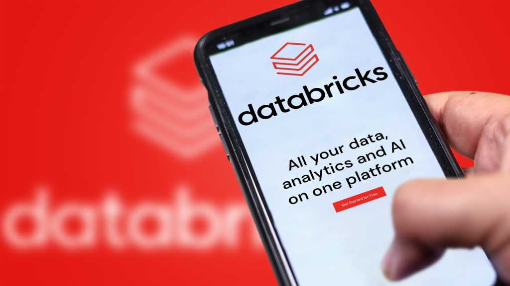 Databricks says its Instructed Retriever offers better AI answers than RAG in the enterprise A photograph of a Databricks website on a phone being held in front of a larger, blurry version of the Databricks logo.