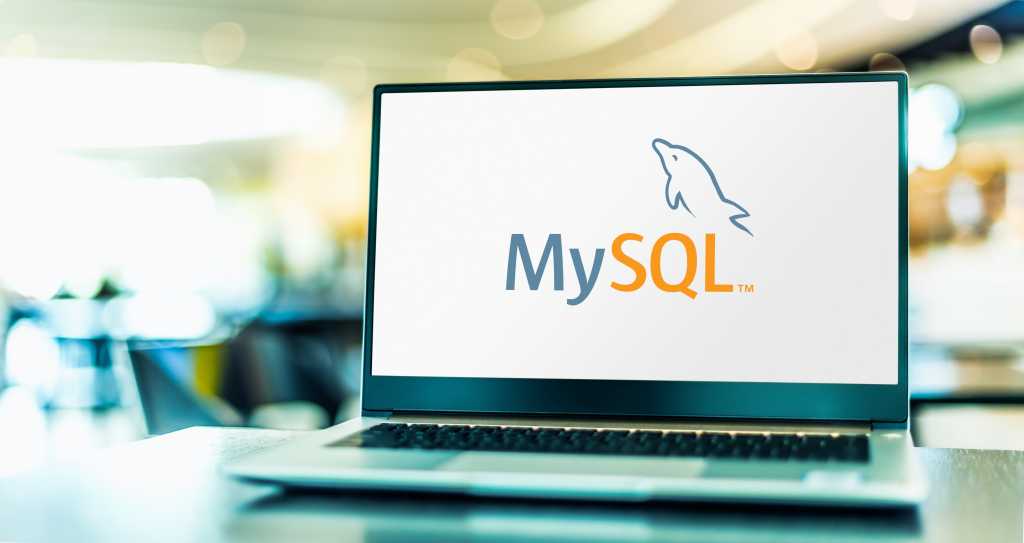 What is the future for MySQL? shutterstock 1932493496 laptop computer displaying logo of MySQL open source database