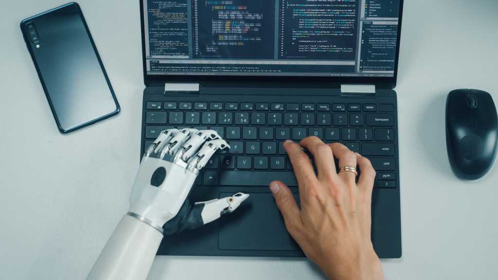 Enterprise use of open source AI coding is changing the ROI calculation AI vibe coding one hand is robot one hand is human