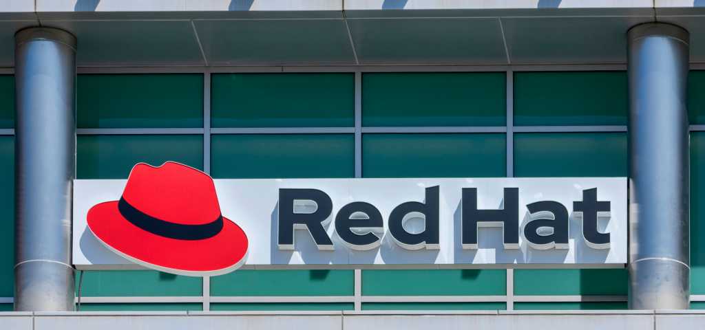 Red Hat ships AI platform for hybrid cloud deployments Red Hat logo and sign on open-source software company office in Silicon Valley. Red Hat has its corporate headquarters in Raleigh, North Carolina - Sunnyvale, California, USA