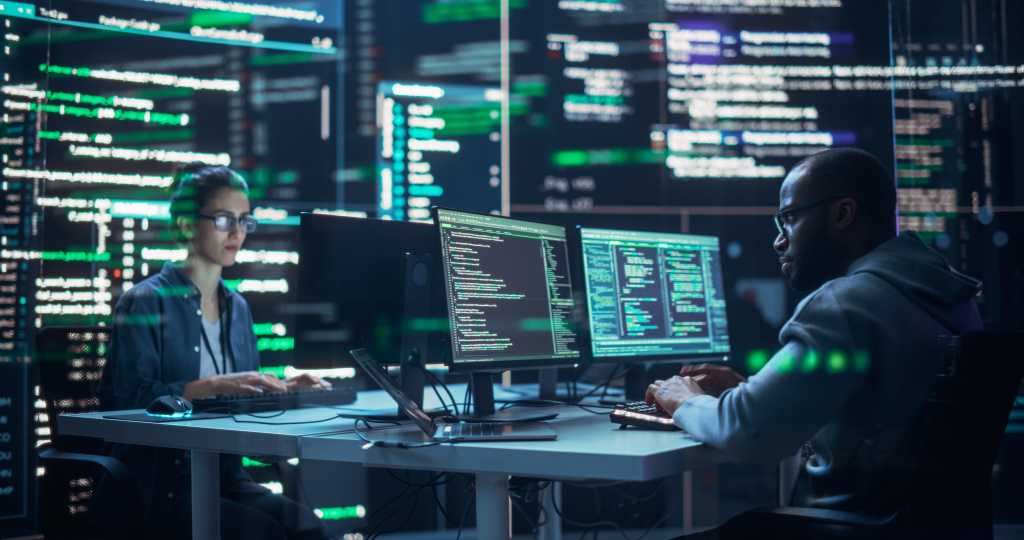 Visual Studio Code previews chat customizations editor Portrait of Two Diverse Developers Working on Computers, Typing Lines of Code that Appear on Big Screens Surrounding Them. Male and Female Programmers Creating Innovative Software, Fixing Bugs.