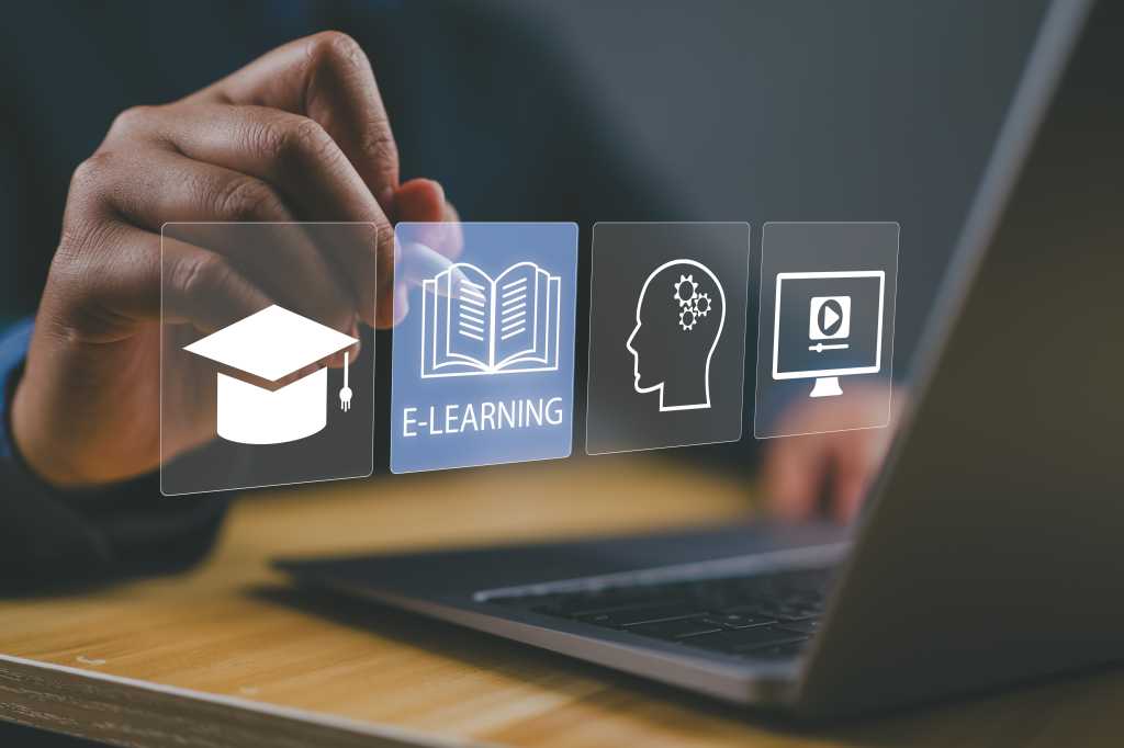 Cloud degrees are moving online Online education and e-learning concepts. A man interacts with e-learning icons virtually, signifying modern online education methods. learning online webinar, video tutorials, training study course