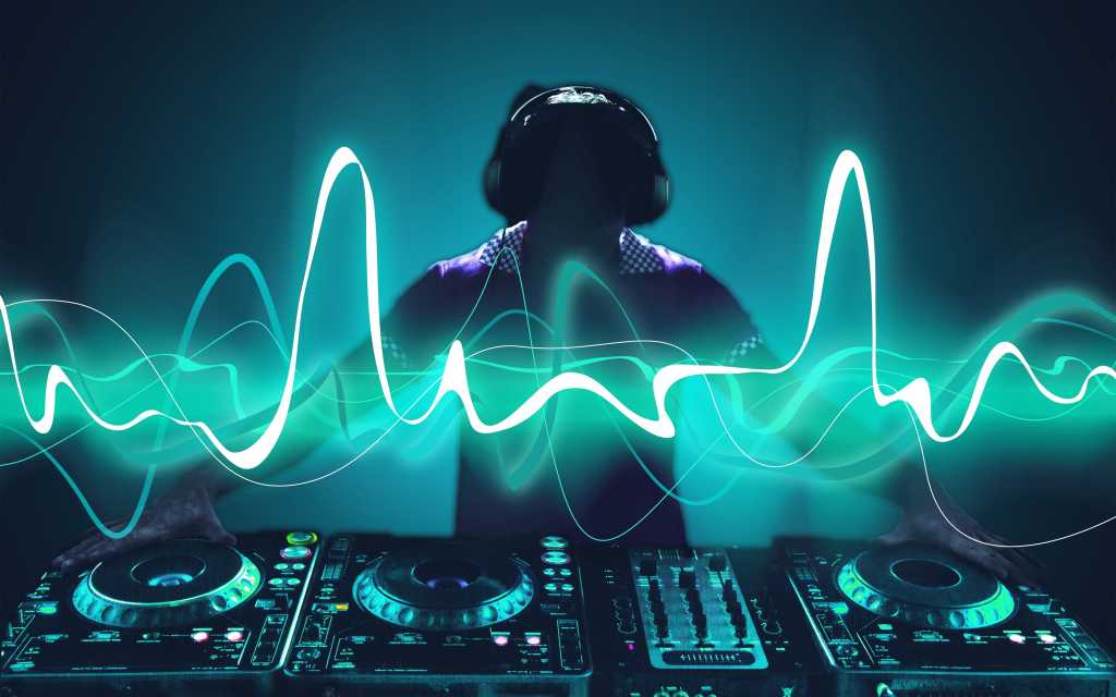 First look: Mojo 1.0 mixes Python and Rust A DJ at the turntables - mixing, remix - Shutterstock