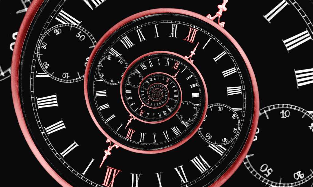 Is Mistral late or savvy? Reversed infinity time spiral; a digital image of a stopwatch with a black background and red spiral representing infinity backward.