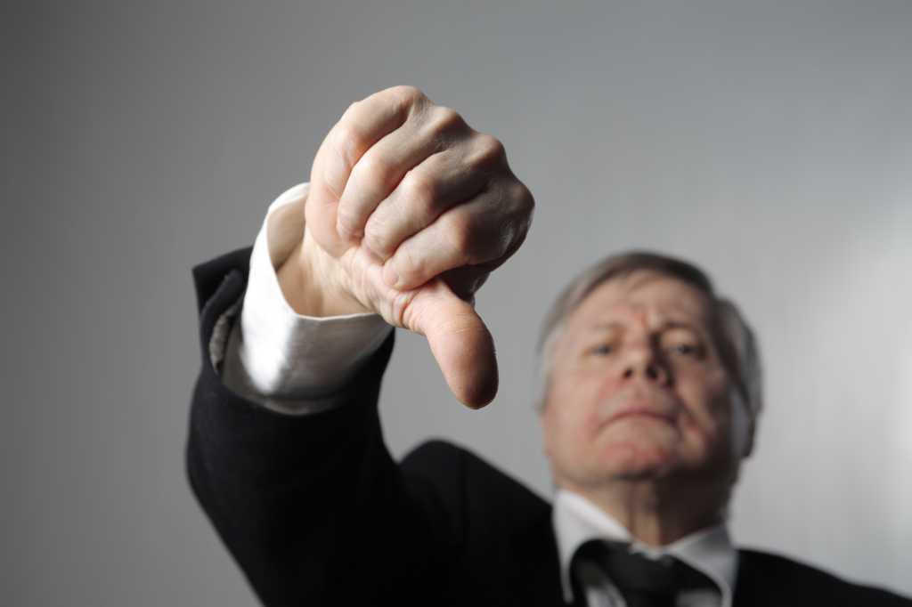 The tokenmaxxing backlash is coming shutterstock 26147695 a businessman with thumbs down boss